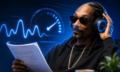 Snoop Dogg quickly reading a research paper.