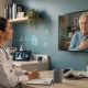 Physician providing AI-assisted telemedicine care to an older patient