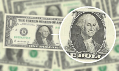 George Washington winking and smiling on the one dollar bill. Source: https://en.wikipedia.org/wiki/Marked_bill + Flux Edit and Adobe Firefly V3