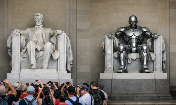 An AI-generated photo of the Abraham Lincoln memorial thronged with tourists, next to a copy of the seated Lincoln statue, which has been substituted by a shiny robot. The robot has no tourists at its feet. Model: GPT-1.5.