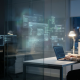 A professional woman in an office at night uses a laptop with a glowing, abstract digital interface floating in the air. The interface shows connected data nodes and windows, symbolizing the