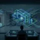 A photorealistic widescreen image of a technician viewed from behind, seated at a dark command center with multiple monitors. A large glass wall in front of him displays a complex, glowing architectural blueprint made of blue and green light. The hologram features intricate pathways, interconnected nodes, and two small silhouettes of figures standing together, representing a human and an AI 