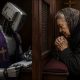 AI-generated image (GPT-2): 'An elderly woman kneels in a dim confessional, quietly confessing through the lattice, while on the other side an industrial-faced robot, draped in a priest’s stole, records her words in a notebook, turning an act of private absolution into an act of observation and capture.'