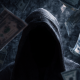 Closeup on a shadowy hooded figure, surrounded by floating cash.