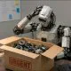 AI-generated image (GPT-2): an industrial humanoid robot sits at an office desk, scratching its head while looking into an open cardboard box labeled 'URGENT' that contains assorted machine parts, gears, electronic components, and circuit boards. An office wall with notes and diagrams is visible behind the desk.
