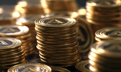 Closeup of stacks of gold tokens.