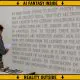 AI-generated image (GPT-2): a construction worker wearing a tool belt stands beneath scaffolding, holding a printed job sheet and scratching his head while facing a large stone wall engraved with a partially completed version of the United States Declaration of Independence in which numerous words have been mistakenly replaced with incorrect alternatives, ending at the word 'foam'. A workbench holding chisels and a hammer stands in the foreground, with stone dust scattered below the unfinished carving. The photorealistic scene is surrounded by a yellow-and-black warning-style border labeled 'AI FANTASY INSIDE' along the top and right edges and 'REALITY OUTSIDE' along the bottom and left edges, with black directional arrows pointing inward.