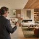 Interior designer visualizing a furnished room with AI