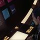 David Bowman (Keir Dullea) sits at a dark control console, speaking with super-computer HAL 9000, surrounded by illuminated panels, amber buttons, blue displays and rectangular light panels, in Stanley Kubrick's '2001: A Space Odyssey' (1968). Credit: MGM/Allstar
