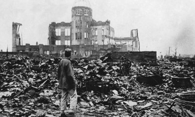 Ruins surrounding the Hiroshima Prefectural Industrial Promotion Hall, now preserved as the Atomic Bomb Dome, after the atomic bombing of สิงหาคม 1945. The building survived as one of the few standing structures near the hypocenter and remains an enduring memorial to the destruction of nuclear war. Picture credit: Associated Press.