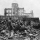 Ruins surrounding the Hiroshima Prefectural Industrial Promotion Hall, now preserved as the Atomic Bomb Dome, after the atomic bombing of สิงหาคม 1945. The building survived as one of the few standing structures near the hypocenter and remains an enduring memorial to the destruction of nuclear war. Picture credit: Associated Press.