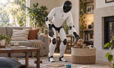 Figure 03 humanoid robot tidying a living room with Helix 2.5