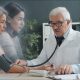 Image by Vitaly Gariev at Unsplash, altered by GPT Image 2.5 to generate an older woman and to turn the real younger woman into an apparition representing stale patient data. Source: https://unsplash.com/photos/doctor-checks-patients-blood-pressure-with-stethoscope-NDOYHZ_98Rw license source - https://unsplash.com/license
