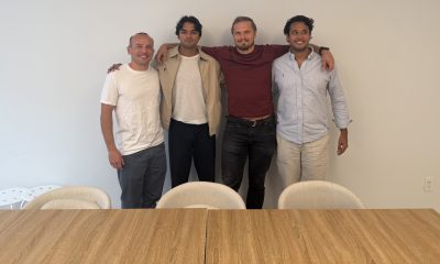Evos founder and CEO Urav Shah with the company’s first three employees during an onsite visit.