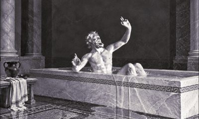A vision of Archimedes shouting 'Eureka' as the dynamics of his bath inspire a new method of volume measurement. The image is outpainted laterally by GPT Image 2 in order to fit the format size, but the middle section is original and comes from https://math.nyu.edu/Archimedes/Crown/Vitruvius.html. The attribution there reads 'This illustration and text are from a magazine advertisement for NBC, probably dating from the 1940’s. It was found among the files of the Print and Picture Department of the Free Library of Philadelphia.'