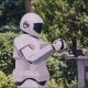 An AI-extended screenshot from the 2012 sci-fi outing 'Robot and Frank', here showing Robot practicing how to pick a lock. Image adapted to format and refined by GPT Image 2 and Photoshop. Still from Robot & Frank (2012). © 2012 Hallowell House, LLC. All Rights Reserved. Used strictly for illustrative and cultural purposes.