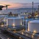 Inspection drone over a refinery tank farm with highlight boxes around storage tanks