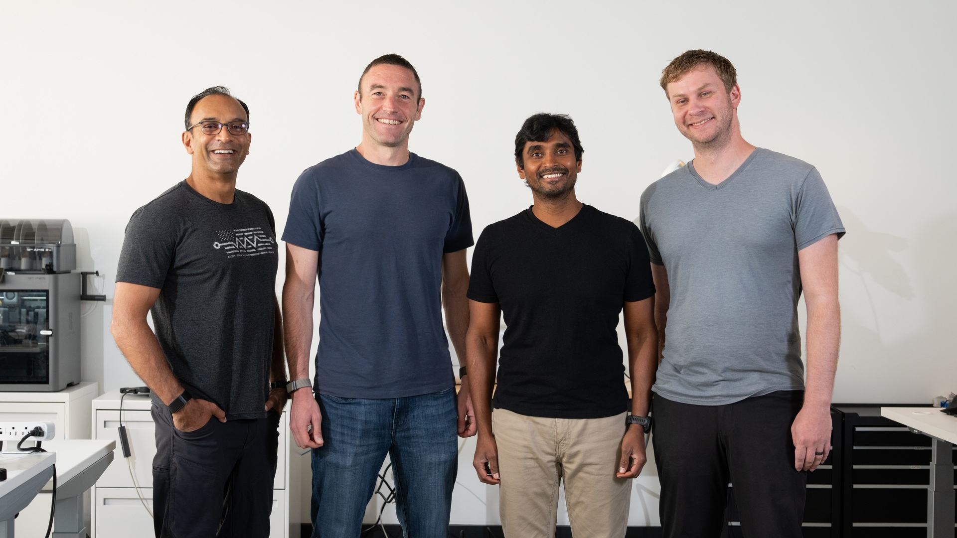 Warp Sciences co-founders standing together in a chemistry laboratory